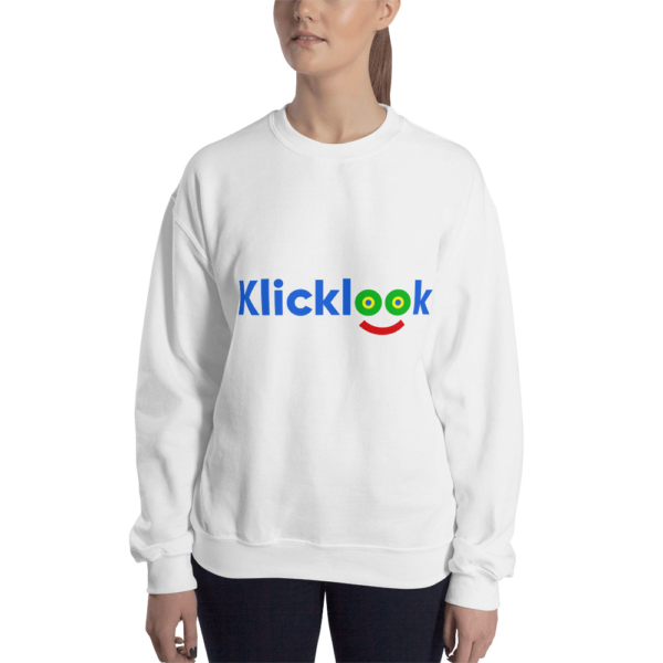 A young woman is wearing stylish Klicklook Unisex Crew Neck Color Sweatshirt.