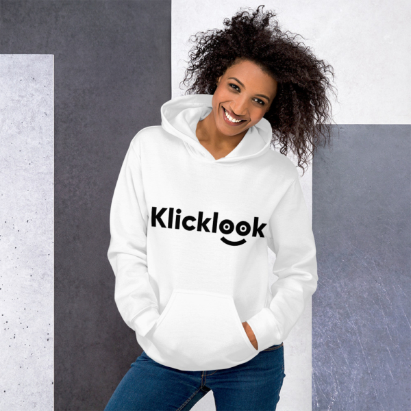 A young woman is wearing stylish Klicklook Unisex White Hoodie.